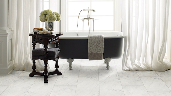 gorgeous marble tile flooring in an elegant bright bathroom